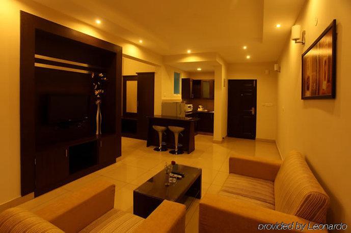 Hotel Nagarjuna Suites Бангалор Номер фото