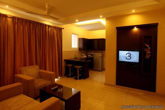 Hotel Nagarjuna Suites Бангалор Номер фото